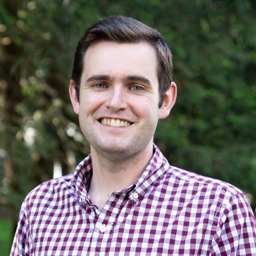 Jack Rooney, the author of this site, poses for an outdoor portrait.